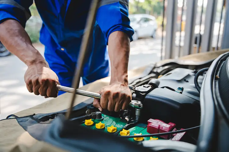 Roadside car battery replacement Dublin — technician fitting battery at roadside in South Dublin